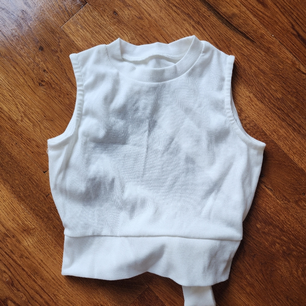 Brand new crop top, size M, cut out back